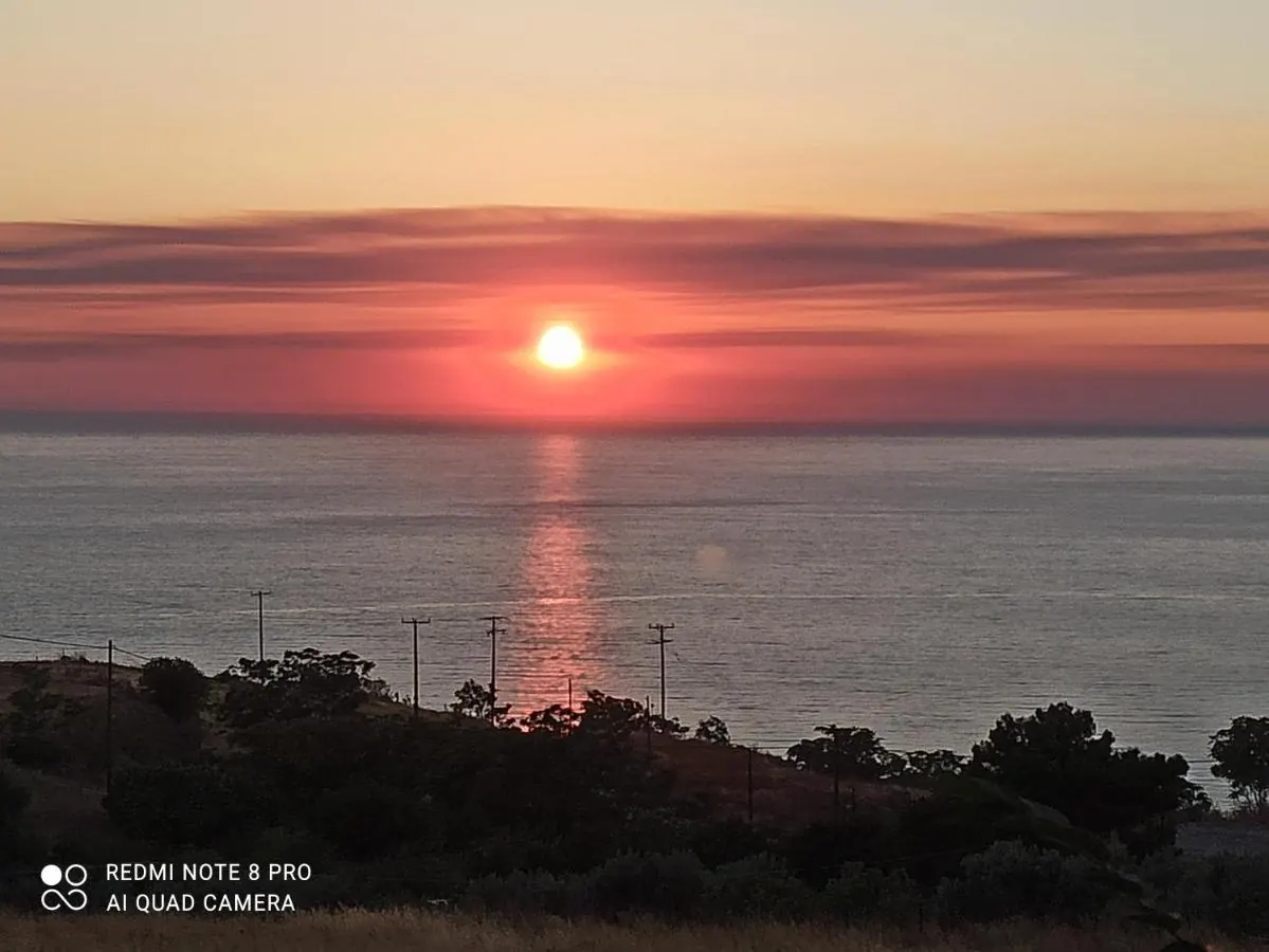 Sunset over the sea seen from the hills